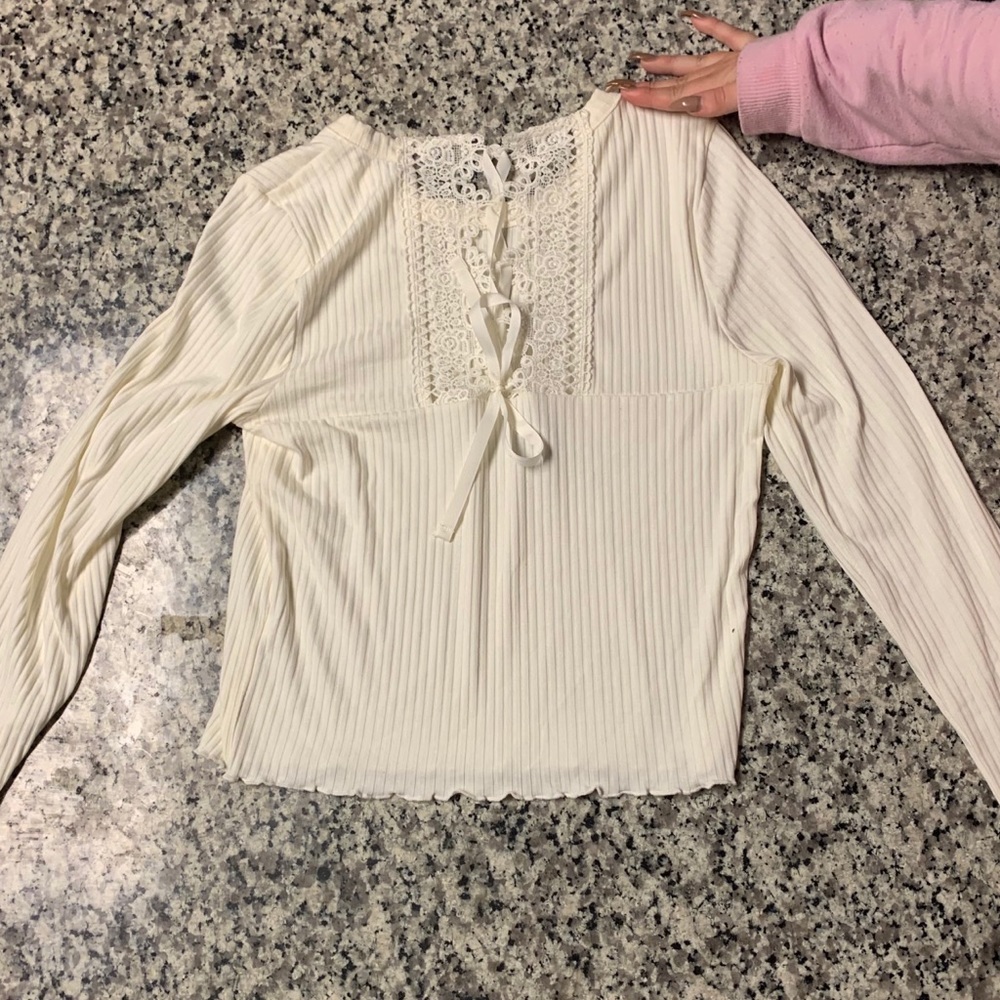 Long sleeve off white colored shirt